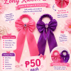 Hair tie with long tailed bows
